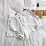 Y2K High-Waist Ripped Denim Shorts – Summer’s Must-Have Trend