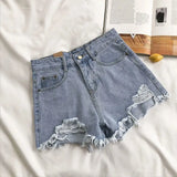 Y2K High-Waist Ripped Denim Shorts – Summer’s Must-Have Trend
